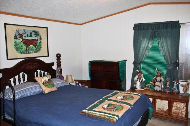 bedroom featuring ornamental molding, a textured ceiling, and vaulted ceiling