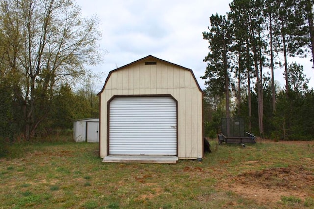 garage with a yard