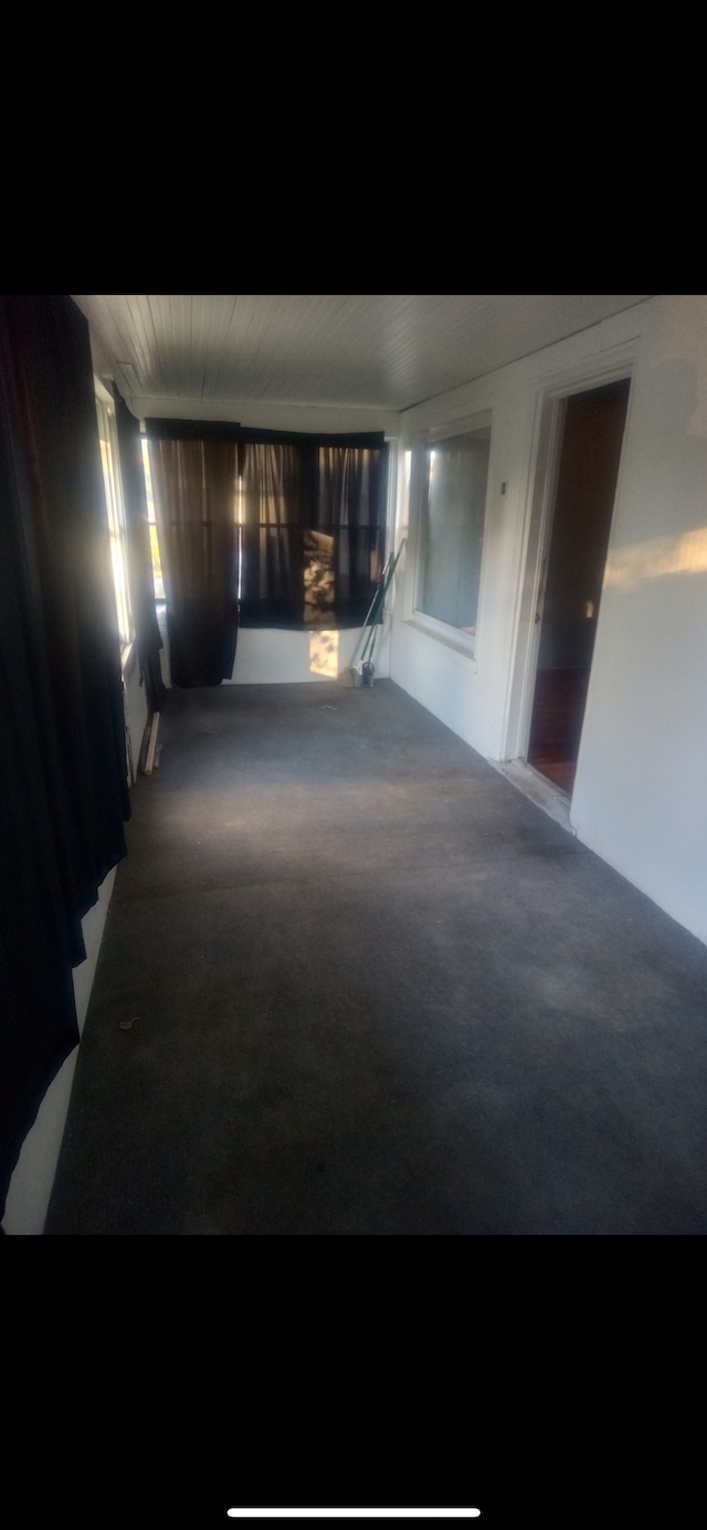 corridor featuring carpet