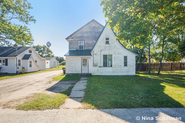 view of front of property with a front lawn