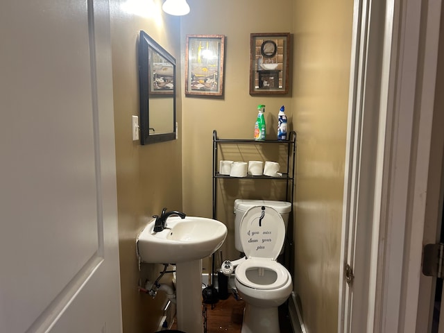 bathroom featuring toilet