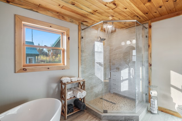 bathroom with hardwood / wood-style flooring, separate shower and tub, and wood ceiling