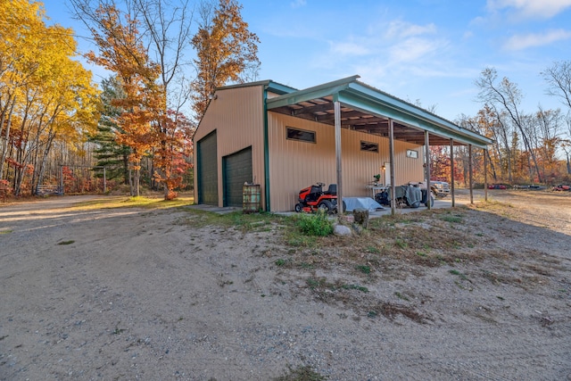 view of outbuilding with a garage