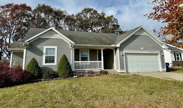 ranch-style house featuring covered porch, a garage, and a front lawn