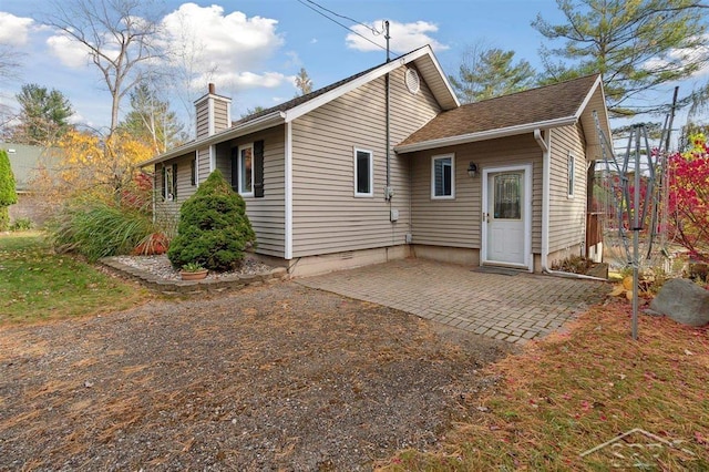 rear view of property with a patio area