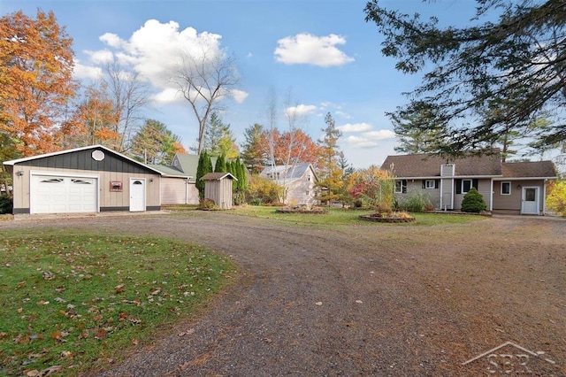 exterior space featuring a front yard and a storage unit