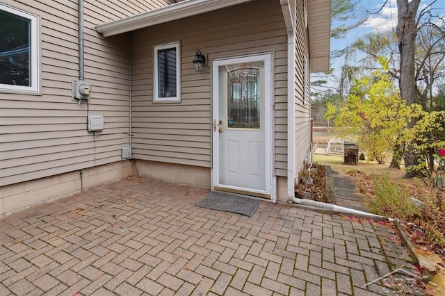 doorway to property featuring a patio area