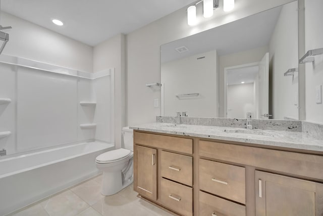 full bathroom featuring shower / bathing tub combination, vanity, tile patterned floors, and toilet