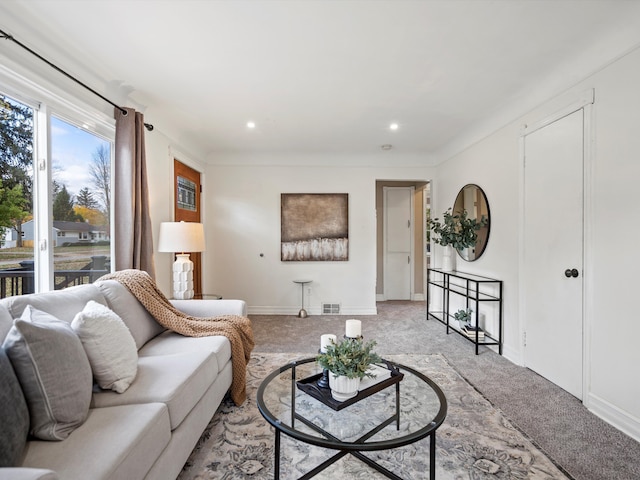 23096 Hawthorne St, Farmington, MI 48336 - living room featuring light colored carpet, baseboards, visible vents, and recessed lighting