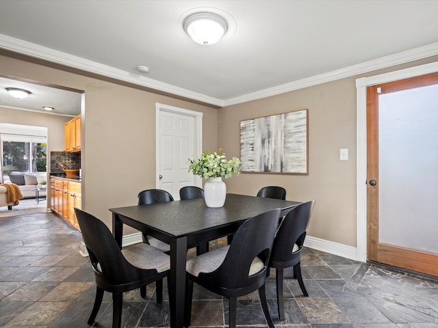 dining room with crown molding