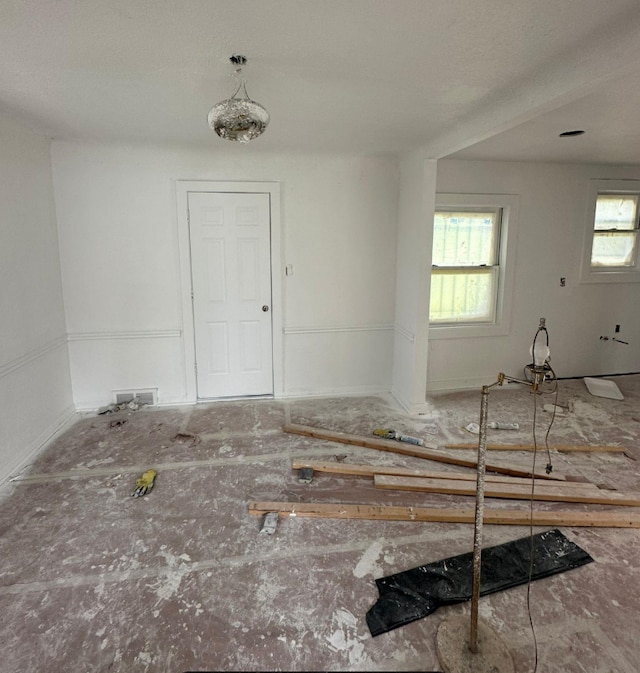 spare room featuring plenty of natural light