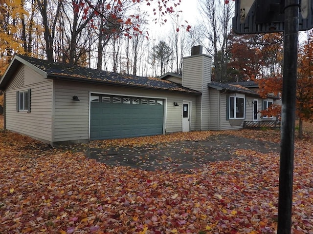 exterior space with a garage