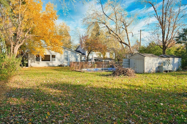 view of yard with a storage unit