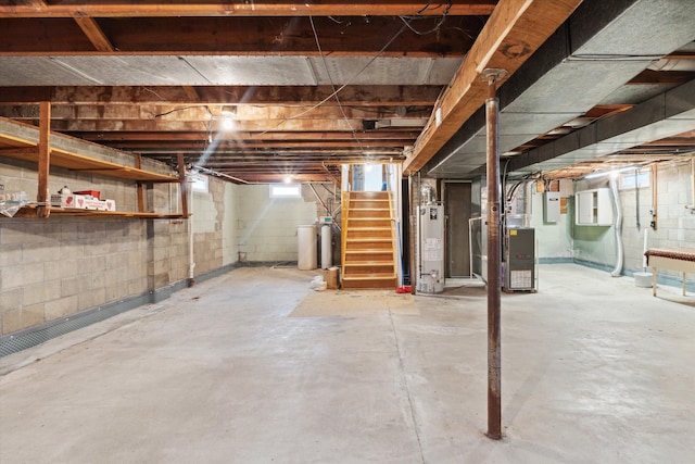 basement with heating unit and water heater