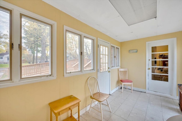 sunroom / solarium featuring a wealth of natural light