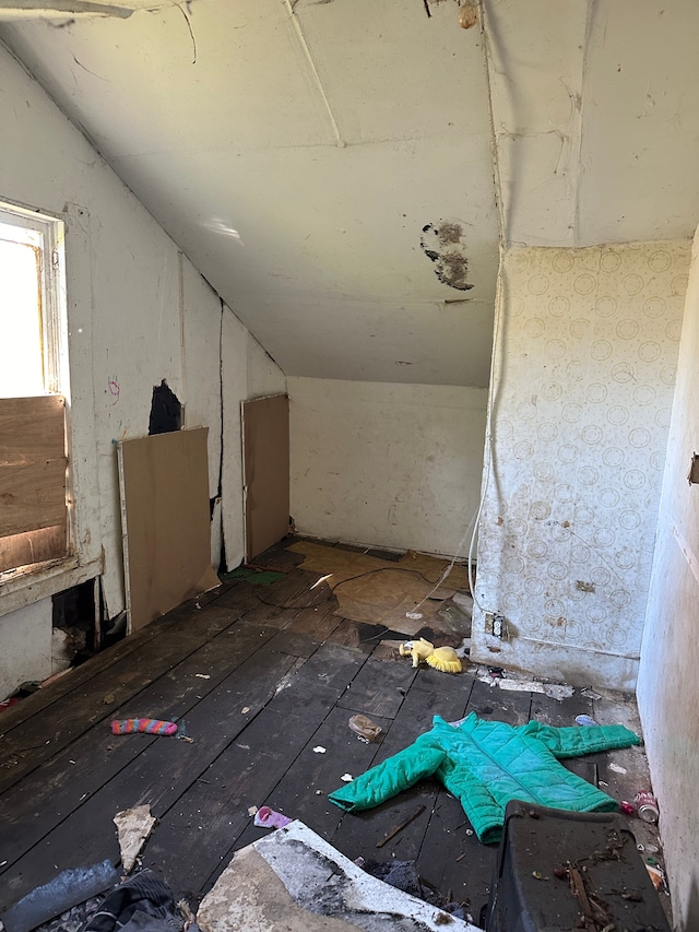 interior space featuring lofted ceiling