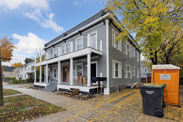 view of home's exterior featuring covered porch