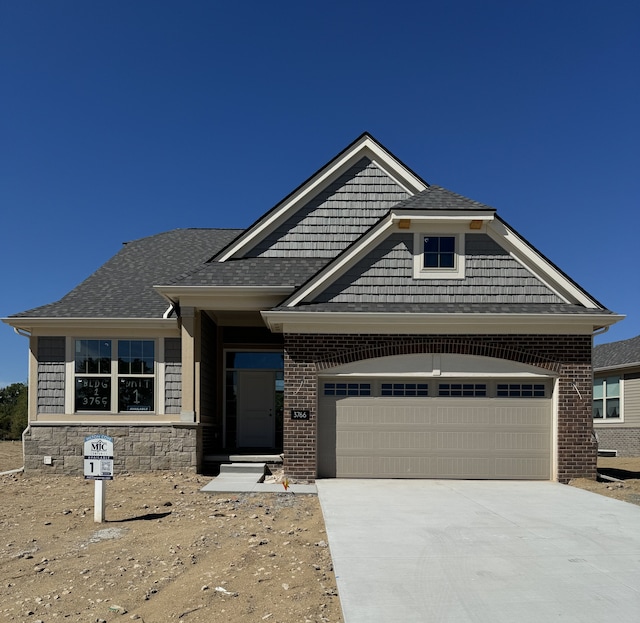 view of front of home with a garage