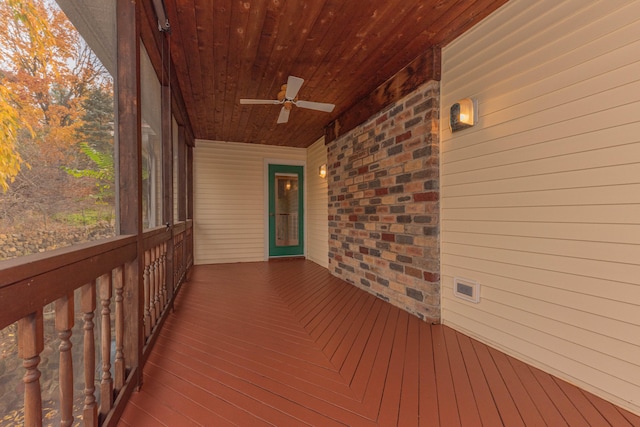 wooden terrace with ceiling fan