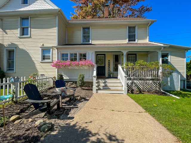 front facade featuring covered porch