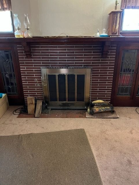 interior details featuring carpet flooring