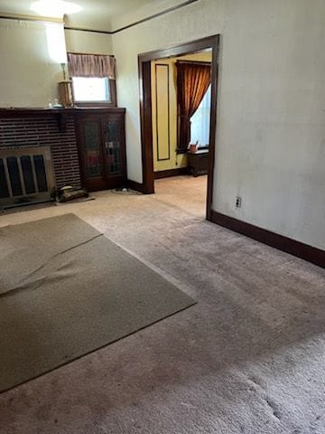 unfurnished living room with light colored carpet