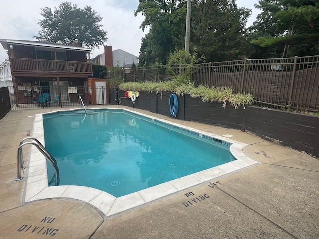 view of pool with a patio area