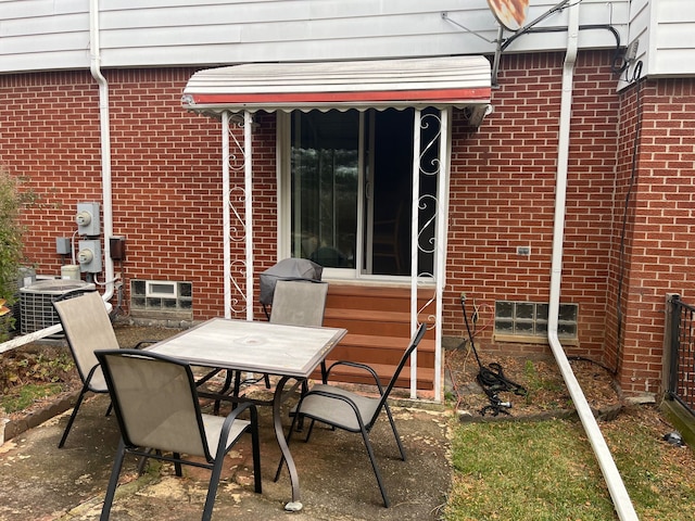 view of patio with central AC