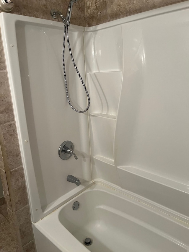 bathroom featuring shower / washtub combination