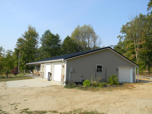 view of side of home with a garage