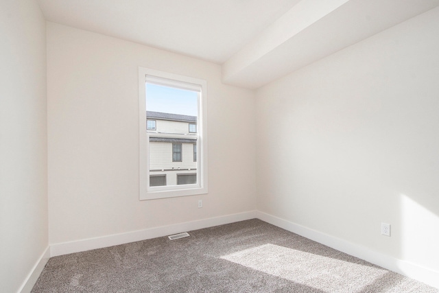 view of carpeted spare room