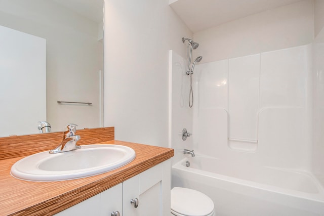 full bathroom with shower / bathing tub combination, vanity, and toilet