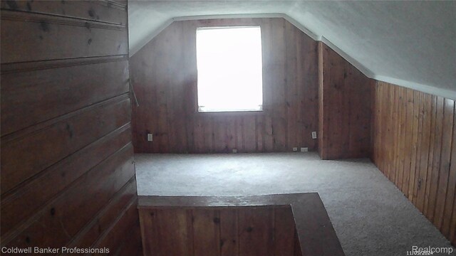 18498 Fielding St, Detroit, MI 48219 - bonus room with carpet flooring, lofted ceiling, and wooden walls