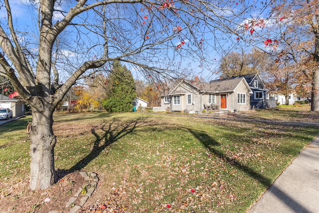 ranch-style house with a front yard