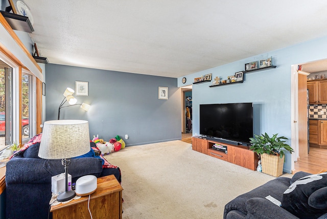 living room with light colored carpet