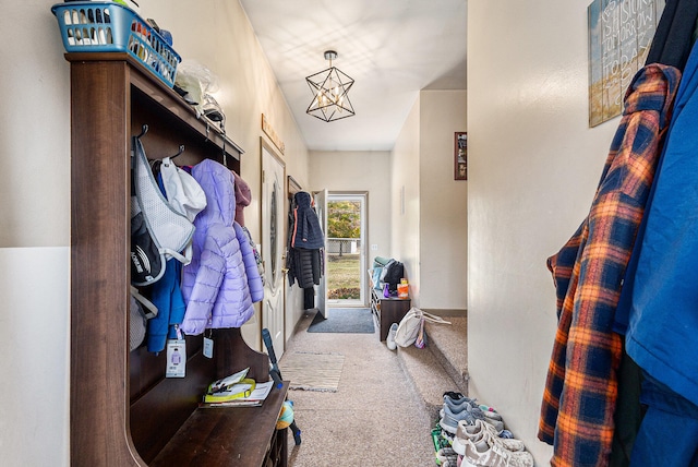 mudroom featuring carpet floors