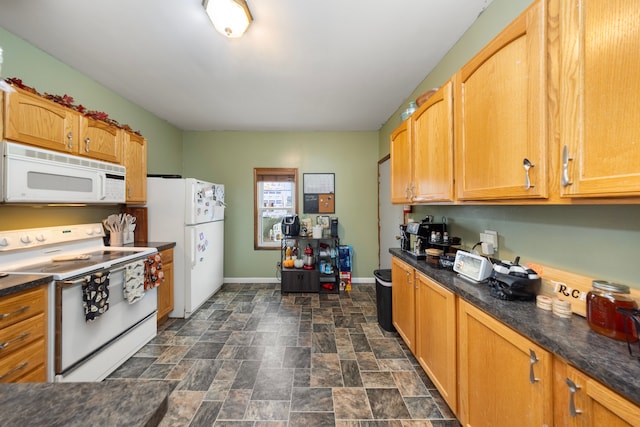 kitchen featuring white appliances