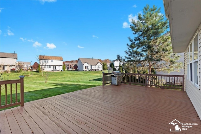 wooden deck with a yard