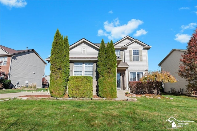 front of property with a front lawn