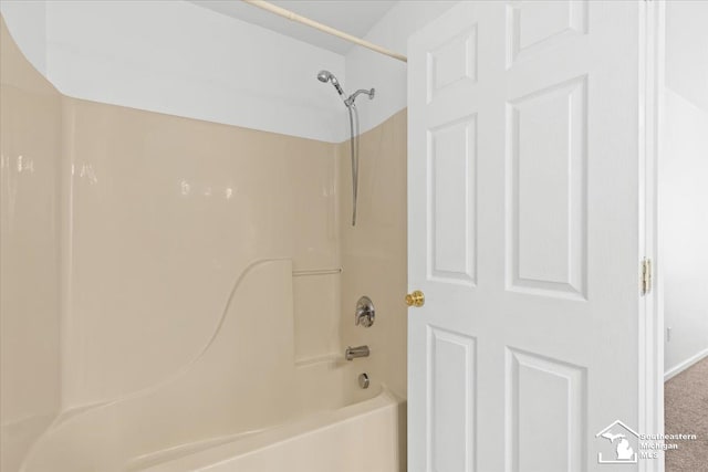 bathroom with shower / bathtub combination