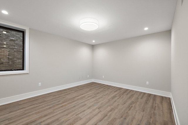 unfurnished room featuring light wood-type flooring