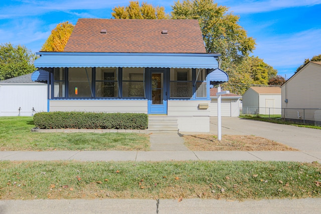 bungalow with a front yard