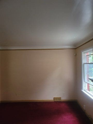 spare room with plenty of natural light