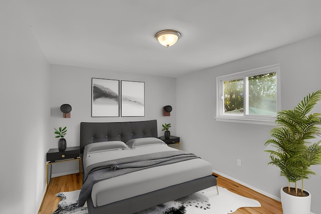 bedroom with light hardwood / wood-style flooring