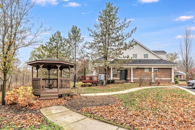 view of front facade with a gazebo and a deck