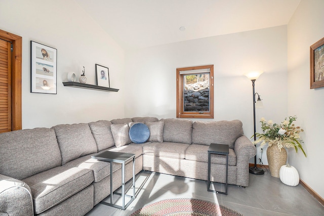 living room featuring concrete flooring