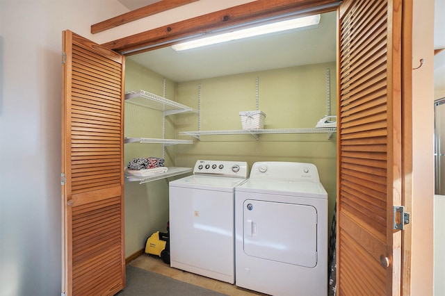 laundry room with separate washer and dryer