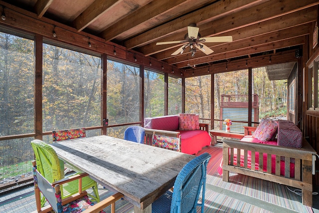 sunroom / solarium with ceiling fan