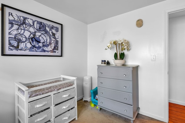 bedroom with hardwood / wood-style flooring