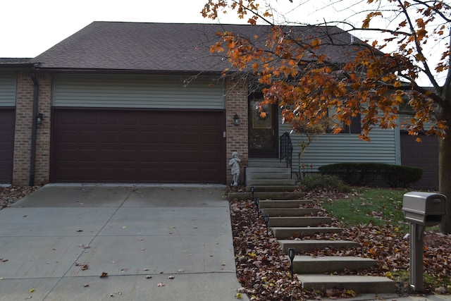 single story home with a garage